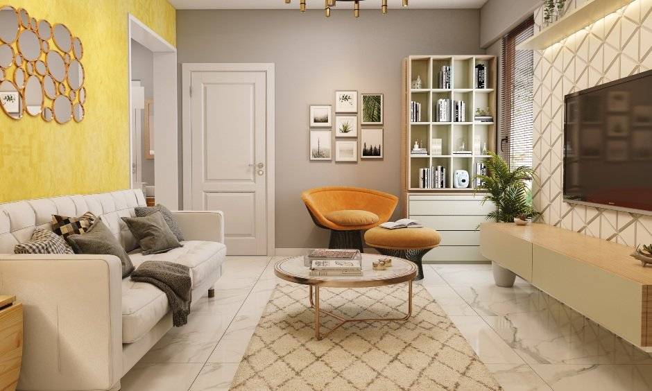 2bhk living room has yellow wallpaper and comfortable sofa