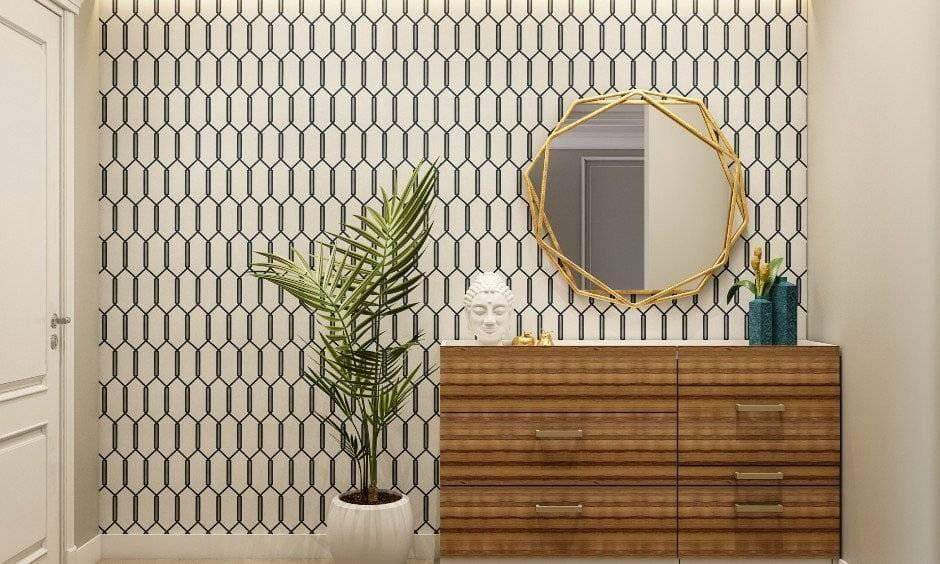 3bhk house foyer with hexagonal mirror and a showcase finished in sophisticated wood look