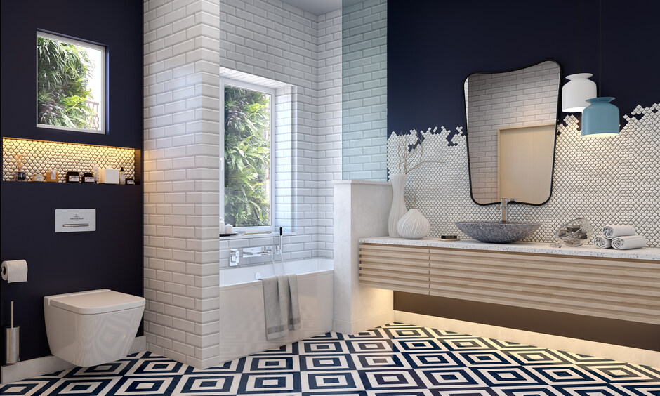 Bathroom design with bathtub featuring navy patterned tiles and geometric flooring.