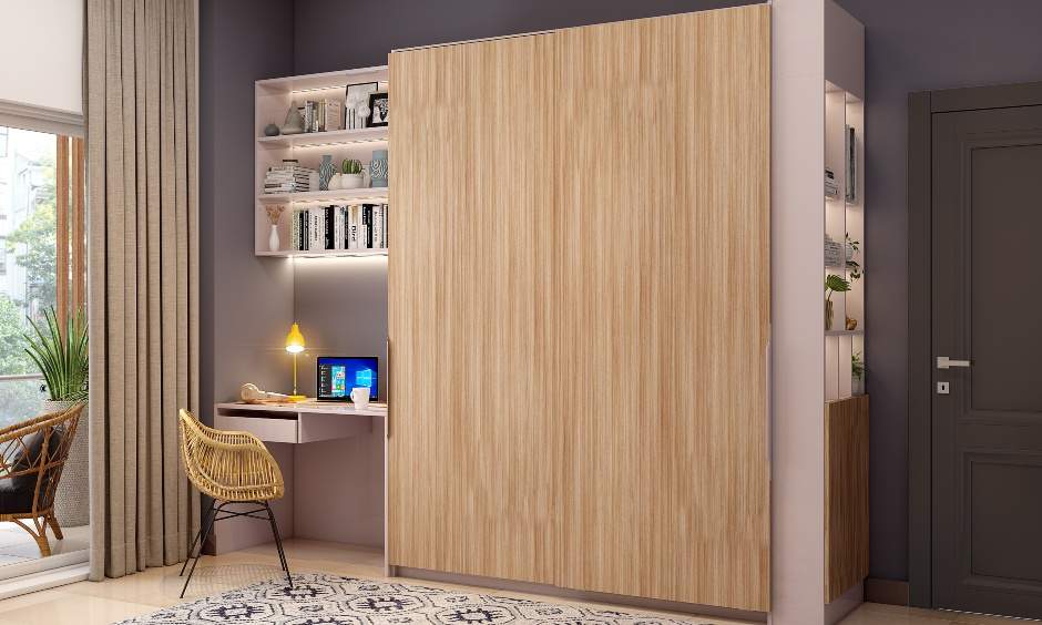 Bedroom study table attached with a sliding door wardrobe