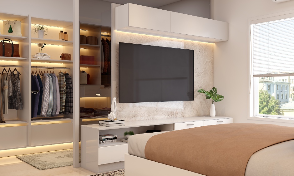 A bedroom tv unit design cum partition between bedroom and walk-in closet
