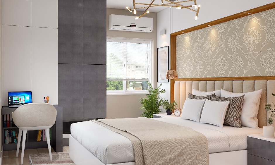 A bedroom wardrobe is designed ceiling-to-floor with an attached pull-out study unit