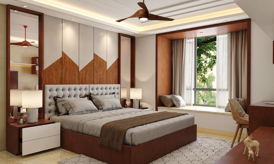 Modern hydraulic bed design with lift-up storage in a contemporary bedroom.