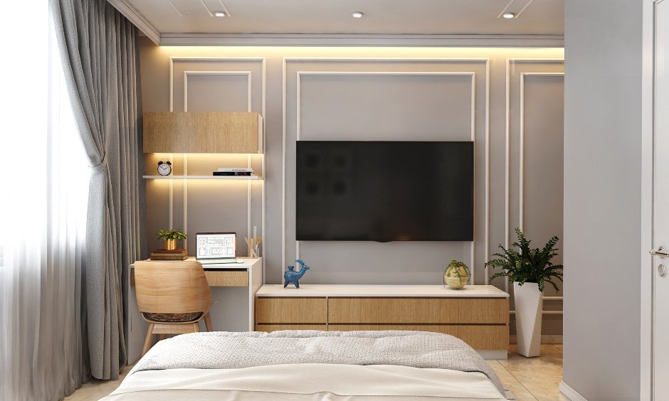 Corner style table design for bedroom with tv unit finished in light wood laminate