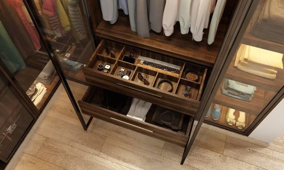Floor to ceiling wardrobe with multiple compartments and drawers for storage items