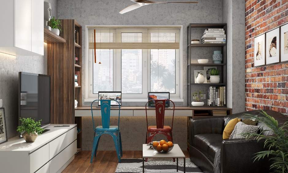 Industrial style home office setup with an attached tall wooden bookshelf is ideal for two