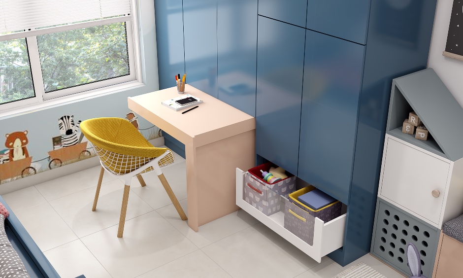 A colorful and functional kids room featuring a wardrobe with a convenient pull-out table.