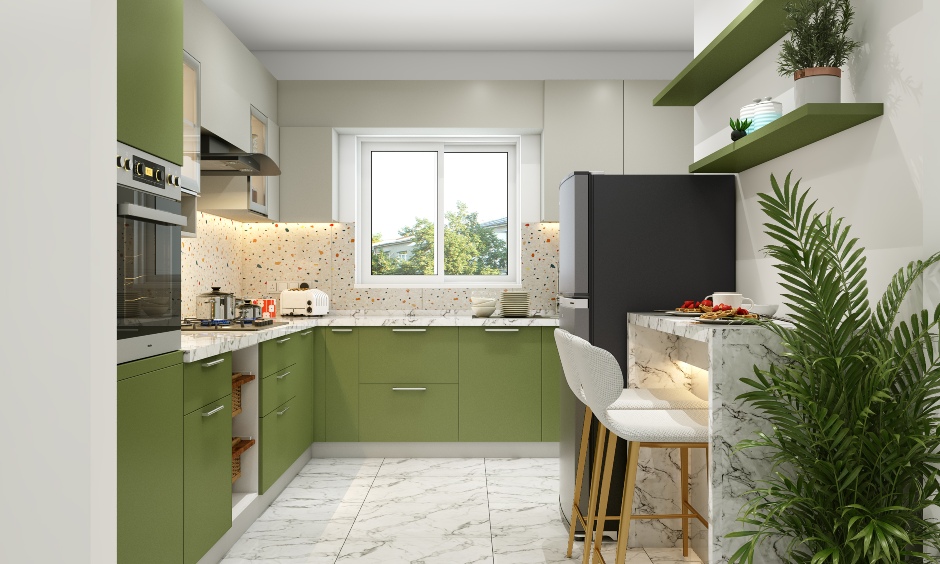L-shaped kitchen interior featuring muted green and grey cabinets