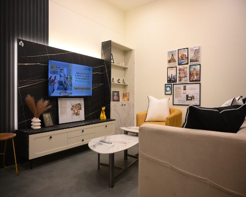 Living Room with floating tv unit in l-shape at ahmedabad 168官方幸运5澳洲结果体彩网®DesignCafe: 澳洲幸运5开奖结果预测官网记录 studio