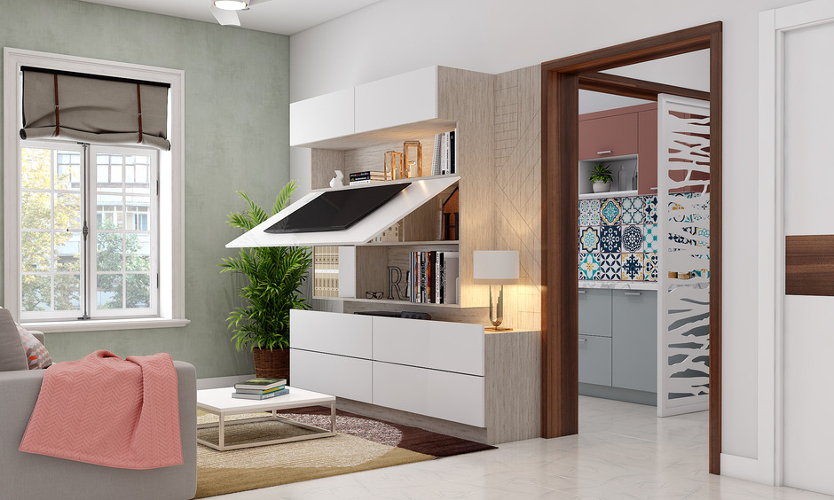 living room with hidden lift-top TV unit design