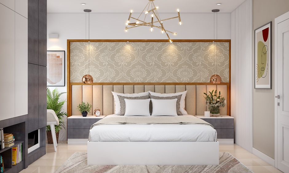 A modern bedroom in a neutral colour features a king-sized bed with a tufted headboard