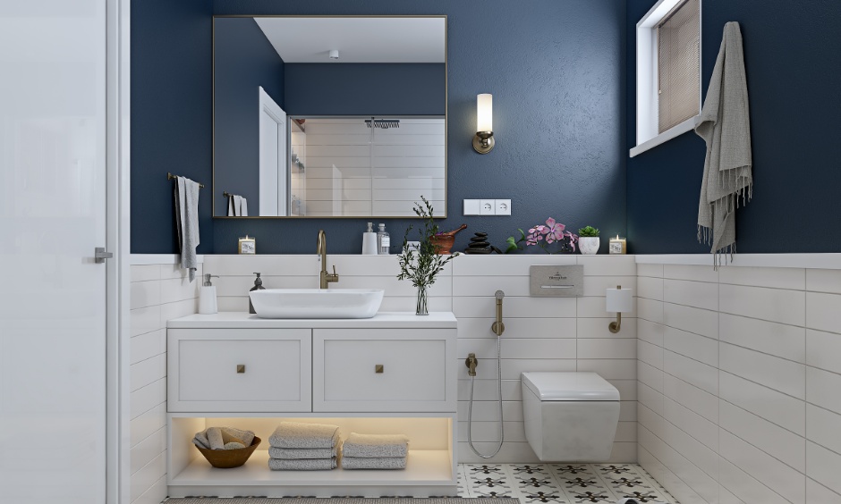 Modern classical bathroom interior design with blue eggshell wall and ceramic tiles for flooring and walls.