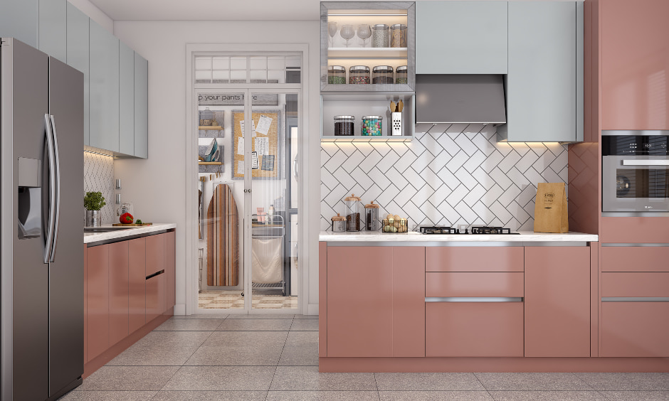 A modern kitchen in dark salmon and azure blue colour lends an aesthetic look