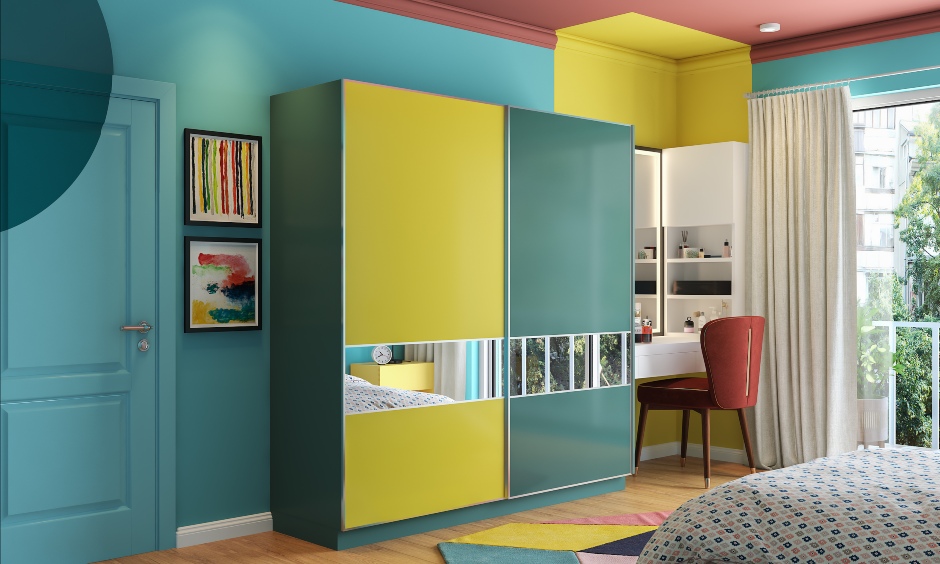 Modular wardrobe design where the drawers, overhead storage and shelves help in compact and neat organisation