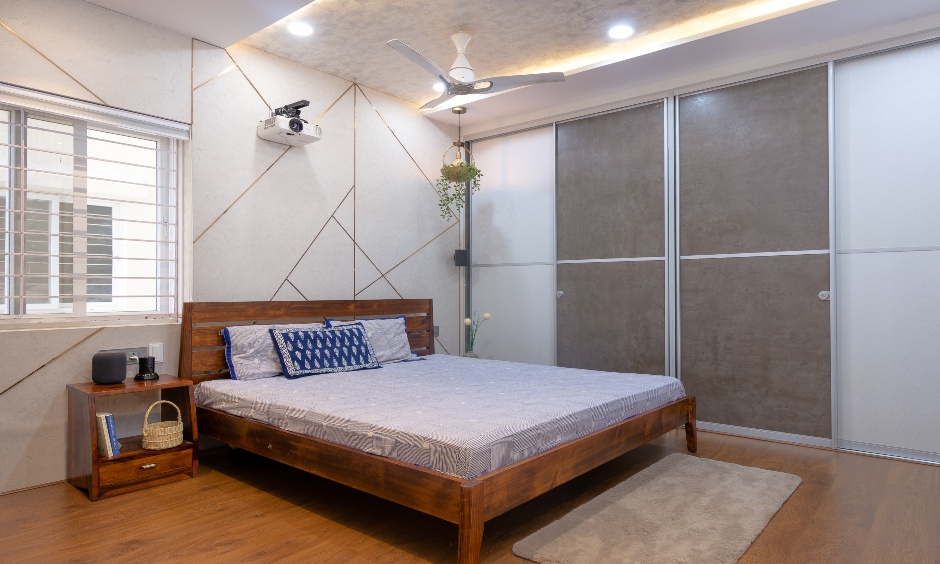Cozy Villa bedroom in Narsingi, Hyderabad with warm textures and ample storage.
