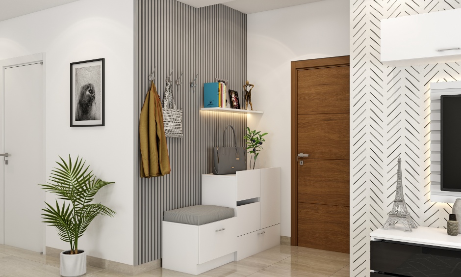 Open scandinavian living room in white and grey with foyer space