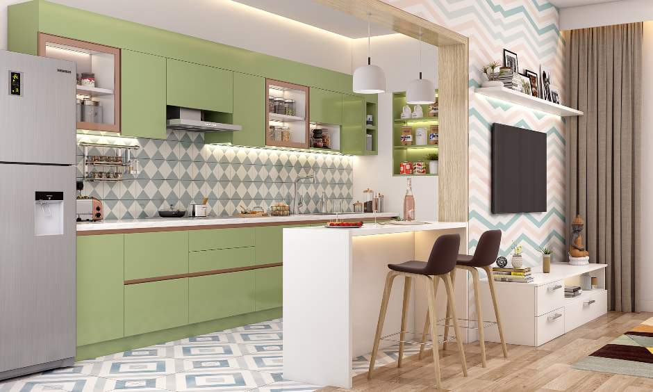 An open straight kitchen with a breakfast counter