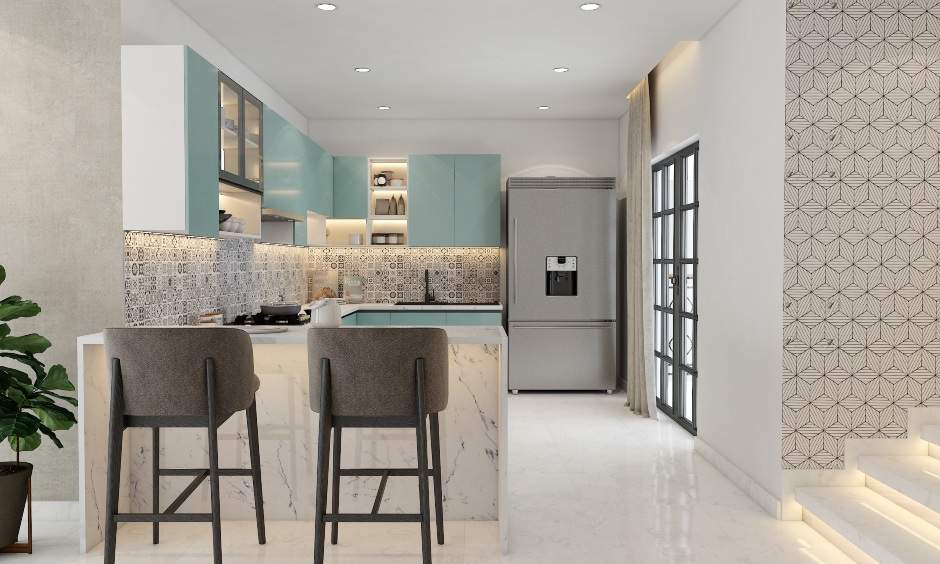 Pastel blue modern kitchen with breakfast counter and stools