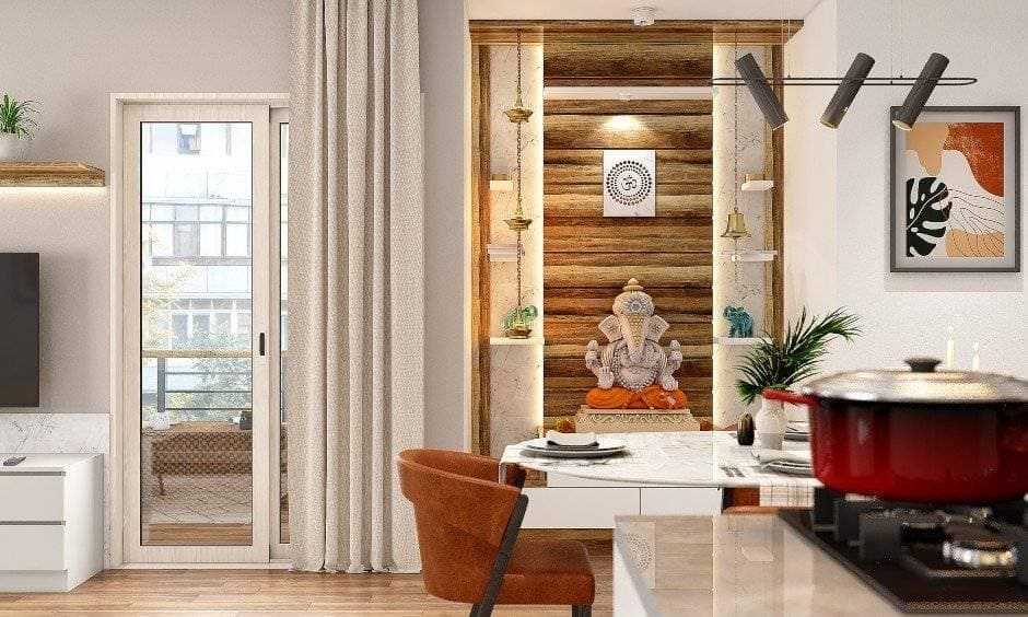 Pooja room in a 3bhk interior design with a wood accent wall cladding and two hanging lamps