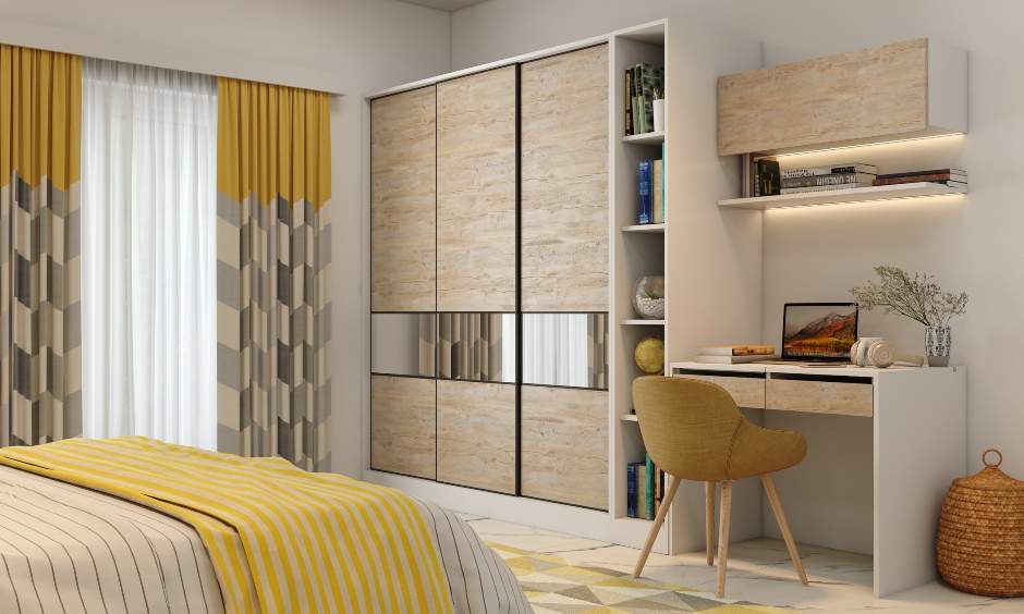 Rustic wardrobe design with a sliding-door mechanism and multiple compartments help in neat organisation of your clothes