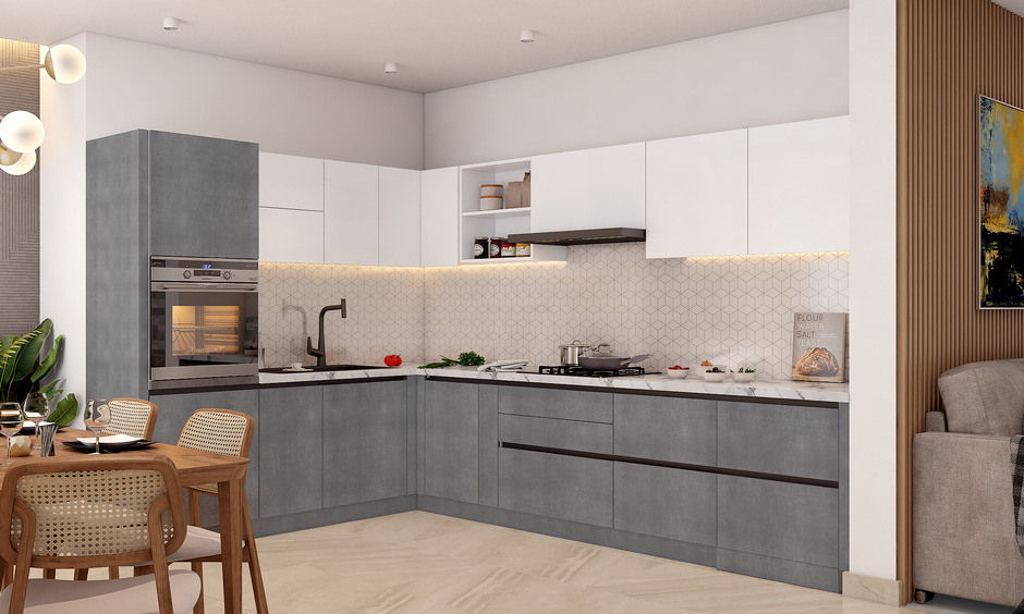 side view of l shaped kitchen with appliance garage and dining table