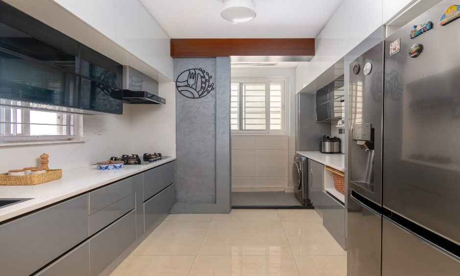 Modular kitchen with efficient storage and elegant flow in Villa at Narsingi Hyderabad.