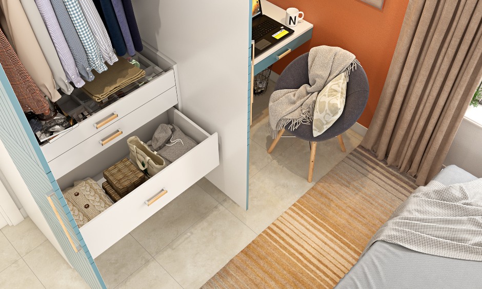 Wardrobe interior design with a shallow drawer with an organiser to keep your belts, ties, perfumes