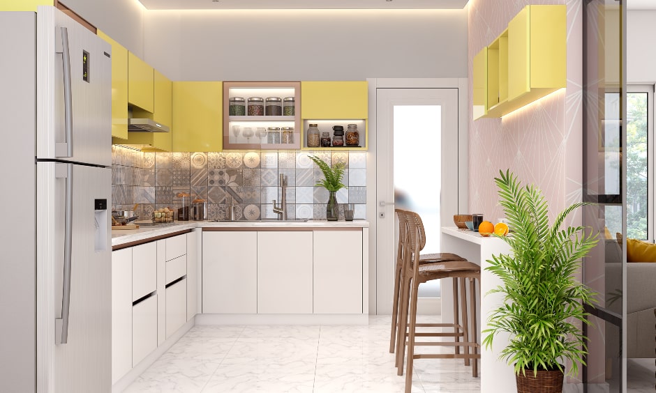 Yellow and white laminate l-shaped kitchen features breakfast counter for two
